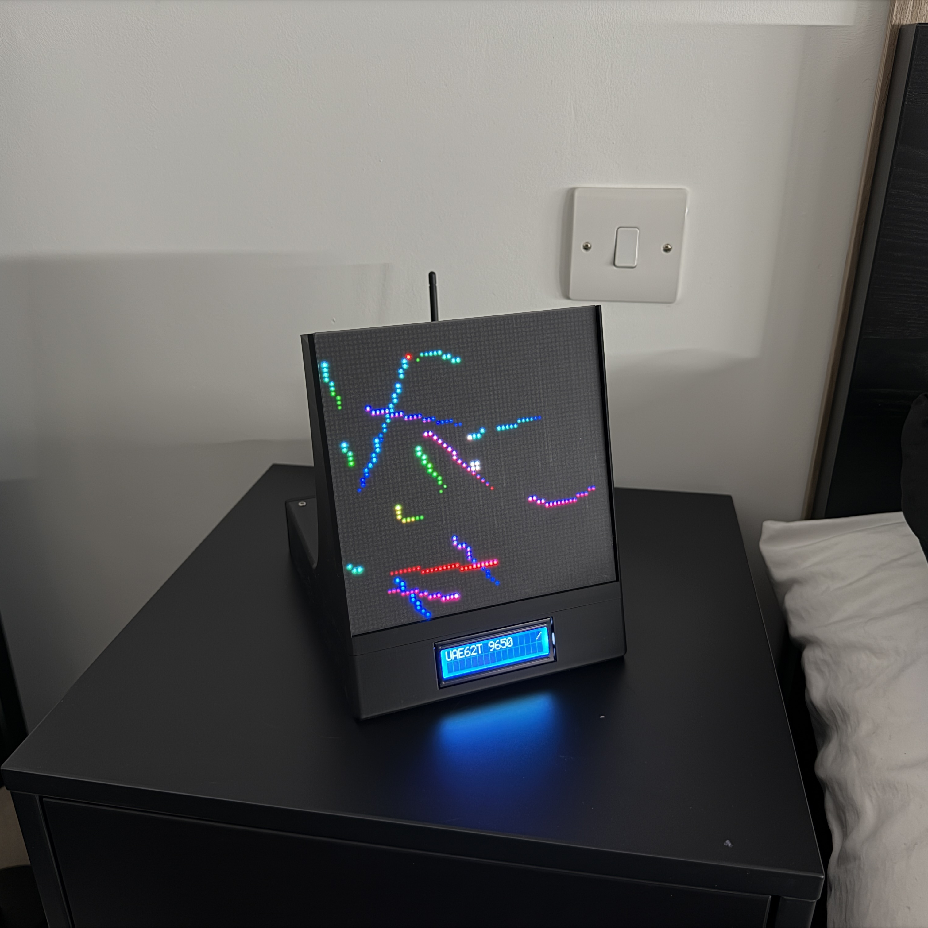 DeskRadar LED matrix display showing live aircraft tracks